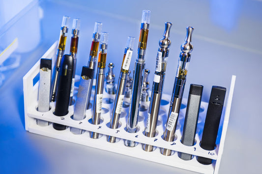 This image depicted a test tube rack that had been stocked with examples of various electronic cigarettes